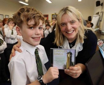 Alison North and Lindley Junior School Choir member 10 yr old Kian Ball who features on every item on the Lindley Sings CD.