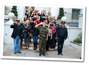 Military Wives group photo with Gareth Malone and Chris Evans saluting