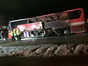 PHOTO: A wheel popped off the bus that was transporting the Wheaton Warrenville South High School show choir, causing a fire and destroying everything on board.